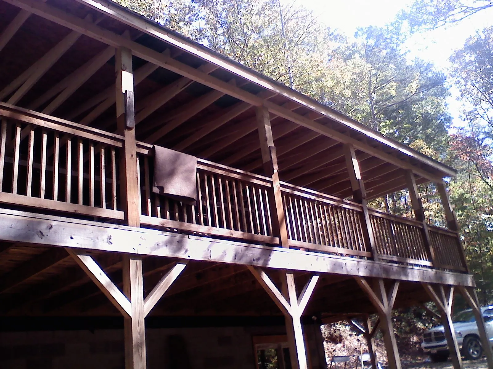 Timber framing under a new elevated porch and deck — Roof Leak Repair in Pittsville by Roofing Brothers